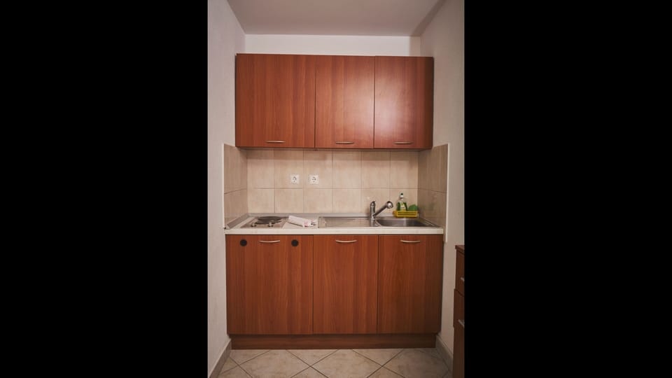 Studio, Balcony, City View | Private kitchen | Fridge, microwave, coffee/tea maker, electric kettle