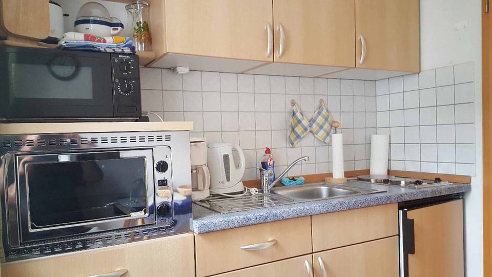Apartment | Private kitchenette | Fridge, microwave, stovetop, electric kettle