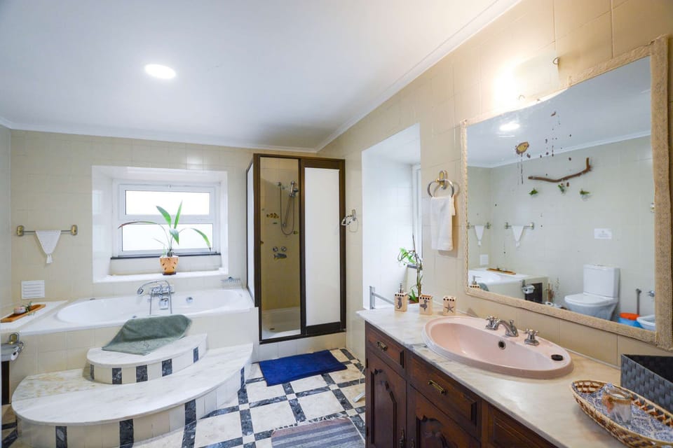 The classic bathroom is a marble wonder with vintage touches.