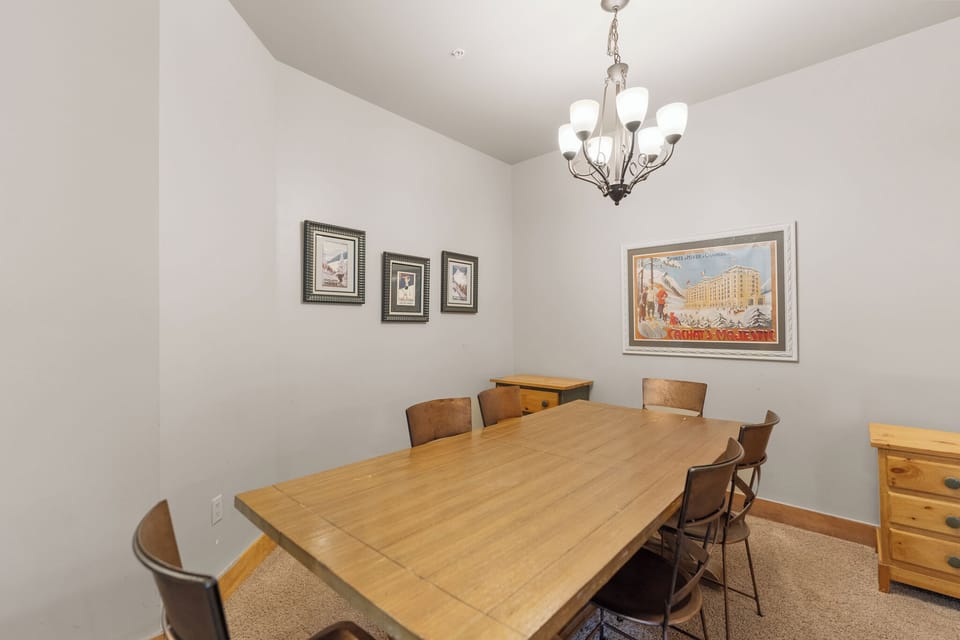 Gather around your private dining table for memorable meals together, with warm lighting and tasteful decor setting the perfect atmosphere.