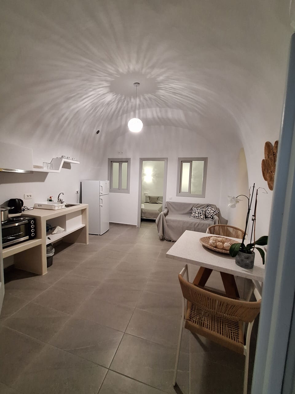 Two Bedroom Cave Villa | Living area | TV