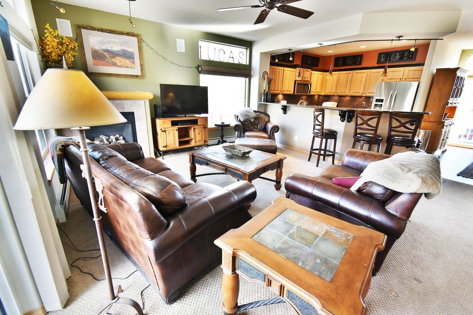 Spacious Living Area with Leather Furniture - Spacious Living Area with Leather Furniture