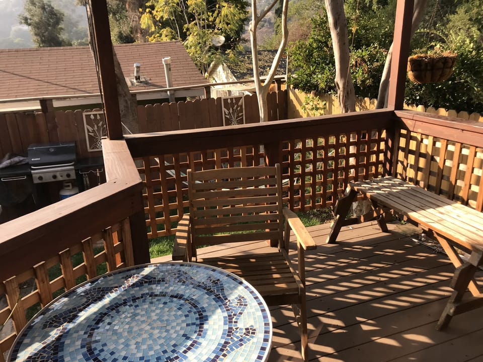 I love the deck which is a secluded outdoor living and dining area !