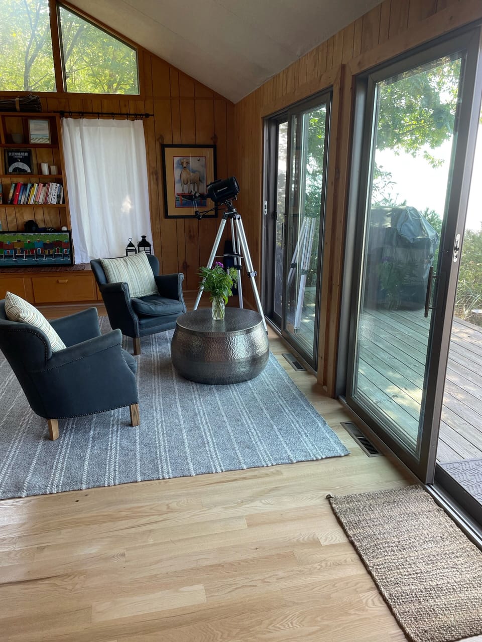 Sitting area in master bedroom with view of lake
Telescope viewing of ships
