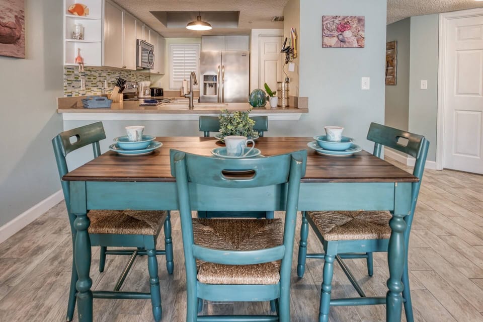 Enjoy your favorite meal at this quaint dining table for 4