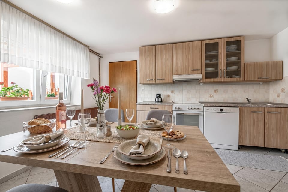 Family House, 2 Bedrooms, Fireplace (Mržek House with Sauna) | Private kitchen | Fridge, oven, stovetop, dishwasher