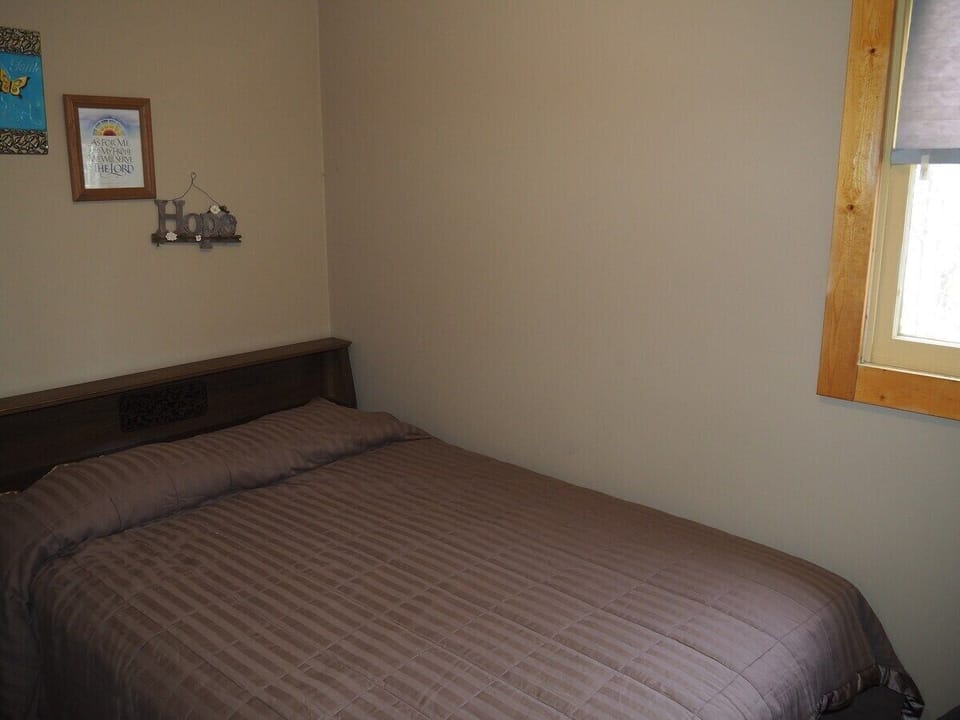 BEDROOM:  The bedroom features a double bed as well, allowing 6 people to sleep in the cabin.
