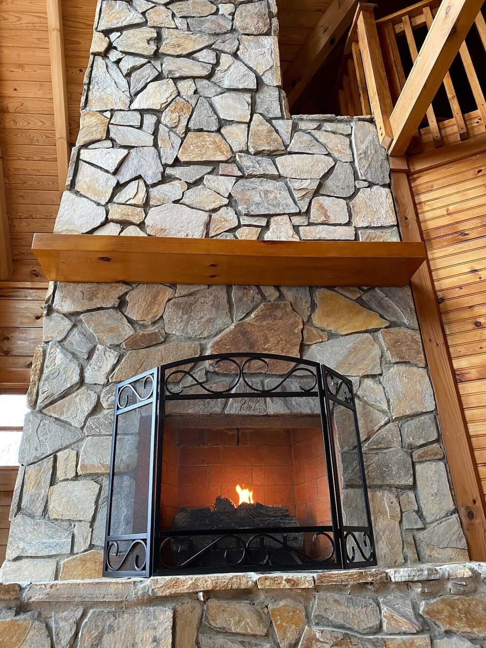 Enjoy the easy to operate gas fireplace for warming the living room.