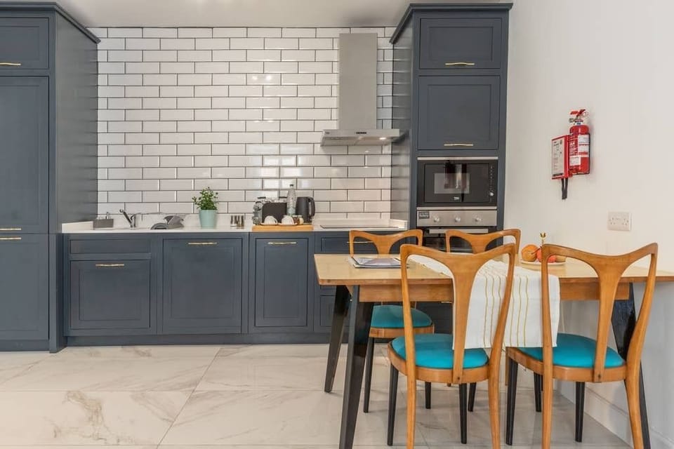 The kitchen-dining area with a fully equipped kitchen for your home-cooked meals.