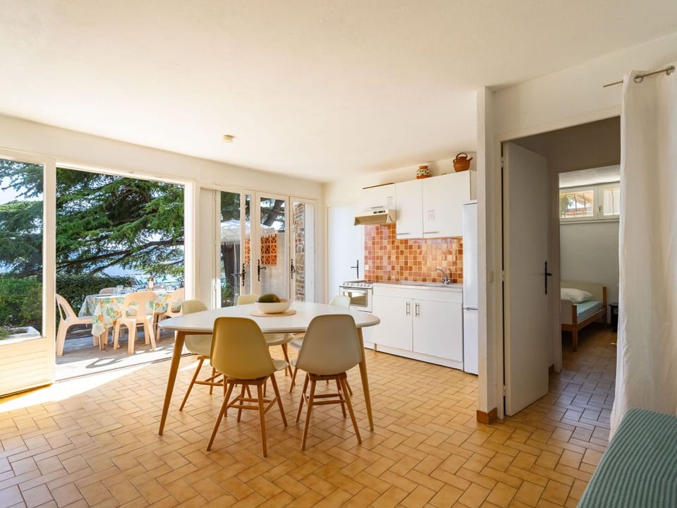 Furniture, Property, Table, Wood, Chair, Flooring, Floor, Cabinetry, Living Room, Interior Design