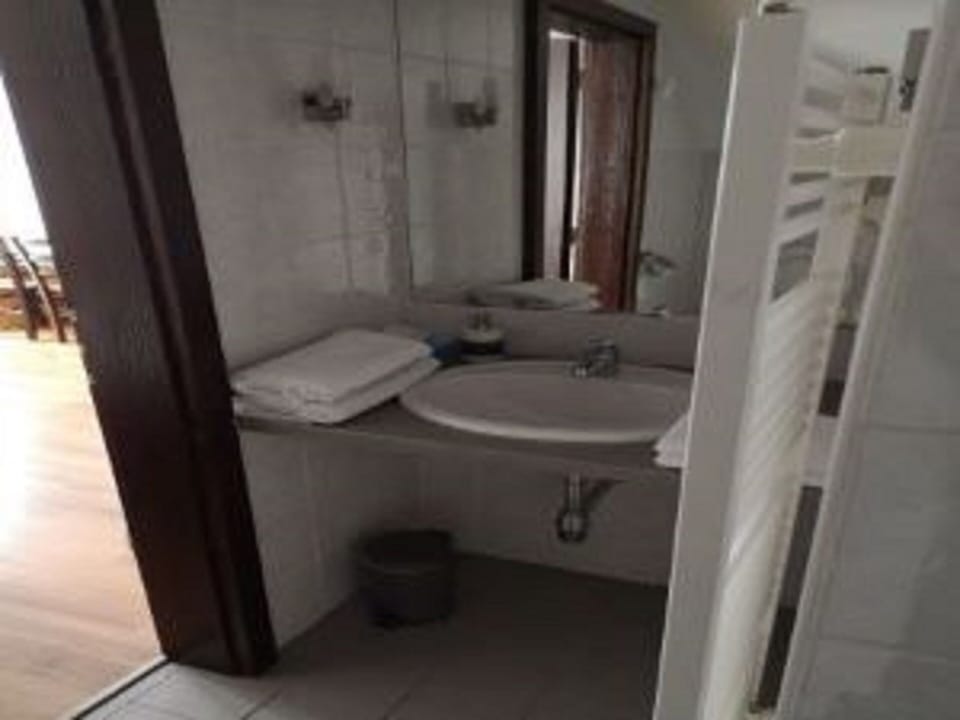 Double Room, Patio | Bathroom | Shower, hair dryer, towels