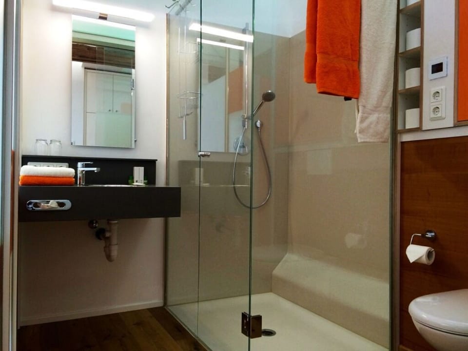 Double Room | Bathroom | Shower, hair dryer, bathrobes, towels