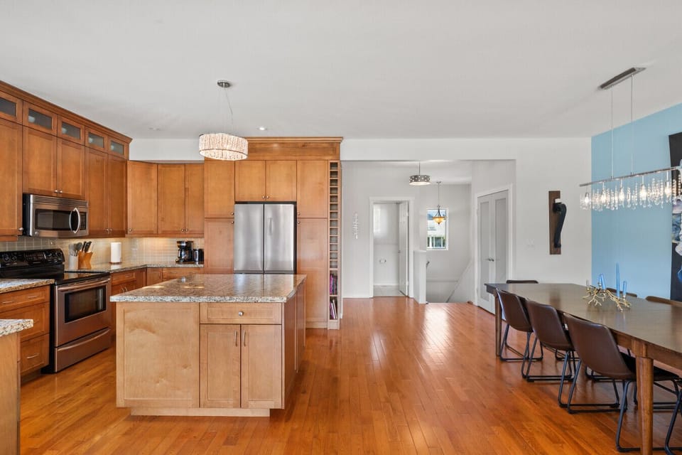 Full kitchen, located on the top (third) floor, with a drip coffee maker, ground coffee, tea, sugar & condiments (ketchup/mustard/relish.)