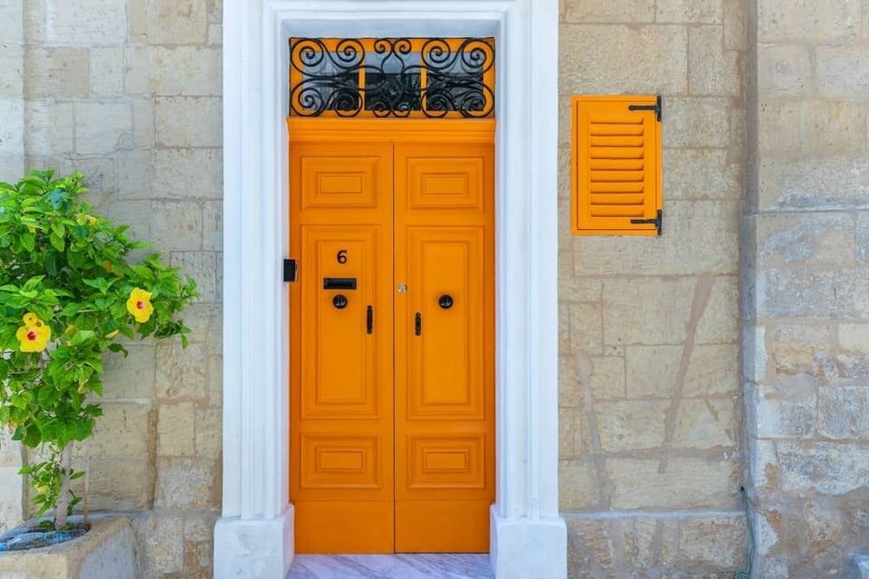 The main door of the apartment block. Orange is our colour!