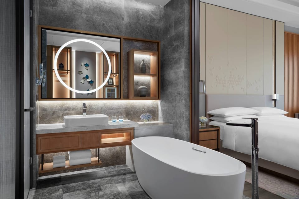 Separate tub and shower, rainfall showerhead, free toiletries