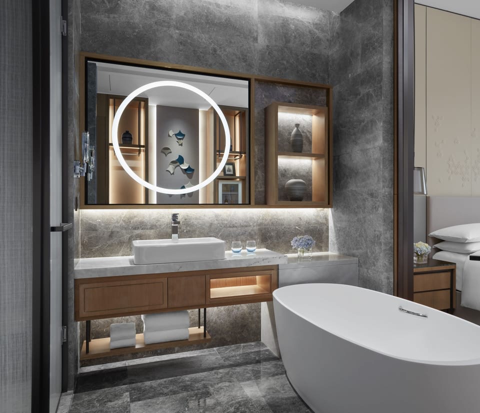 Separate tub and shower, rainfall showerhead, free toiletries
