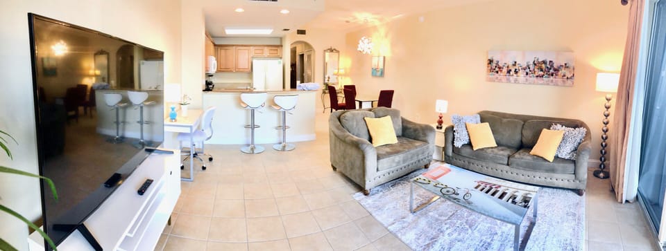 Plenty of sitting space in the living room to enjoy and watch the brand new TV