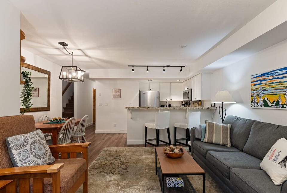 Bright and open with a seamless flow to the dining and kitchen areas.