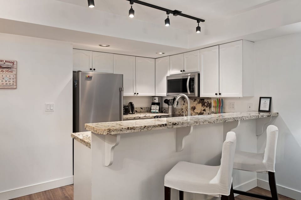 Open-plan design keeps you connected while you cook.