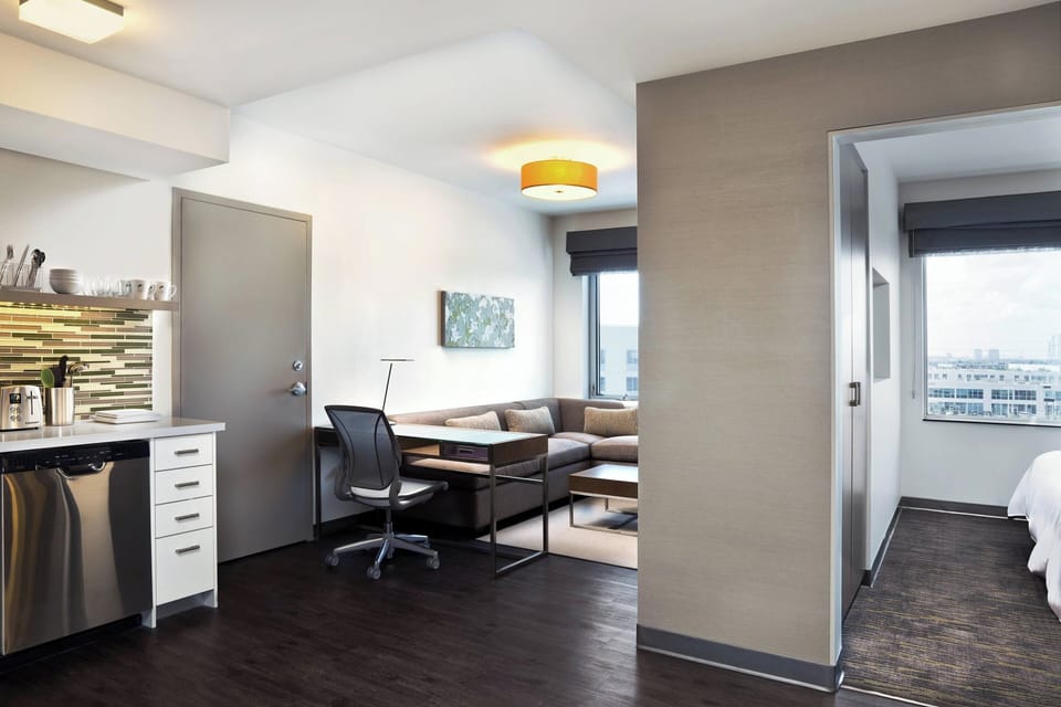 Suite, 1 Bedroom | Hypo-allergenic bedding, down comforters, in-room safe, desk