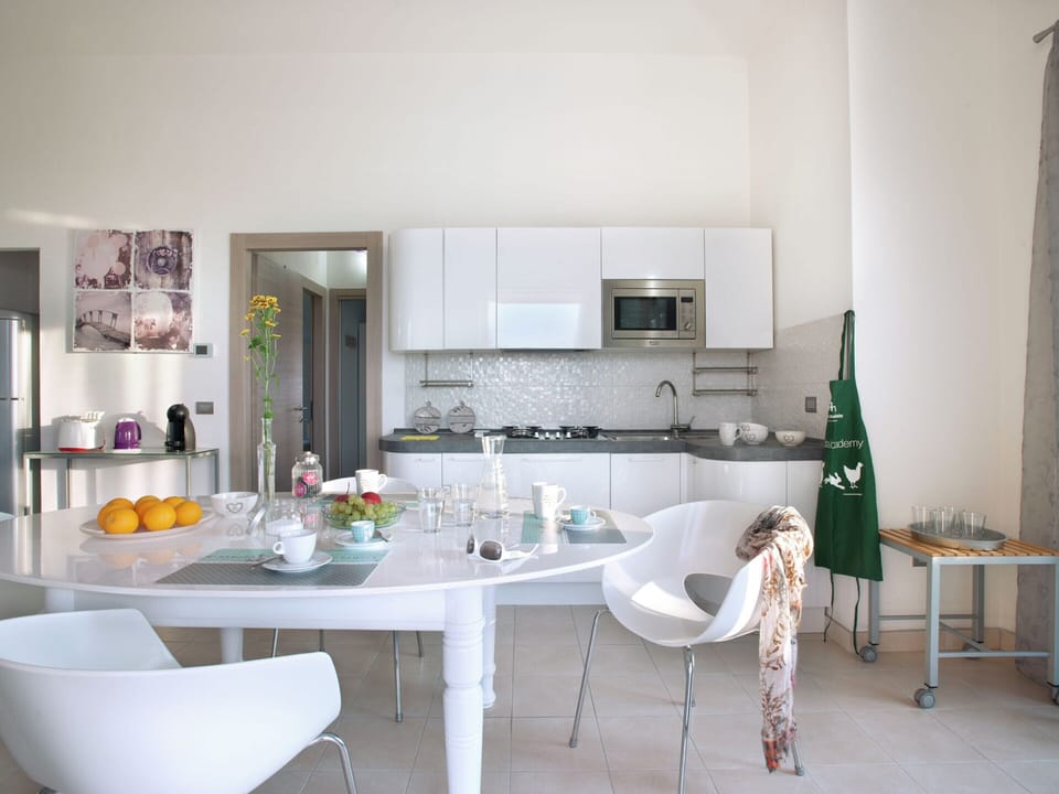 Villa | Private kitchen | Electric kettle, highchair