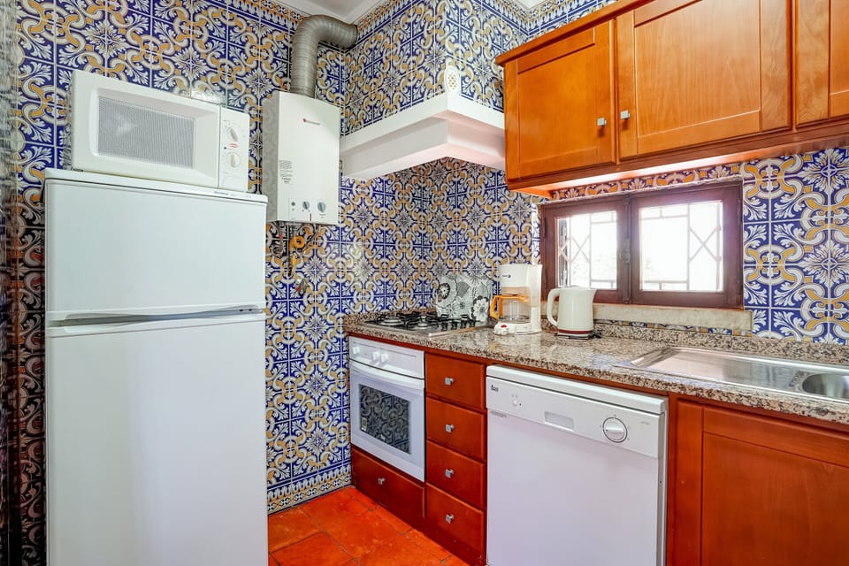 Villa | Private kitchen | Stovetop, coffee/tea maker