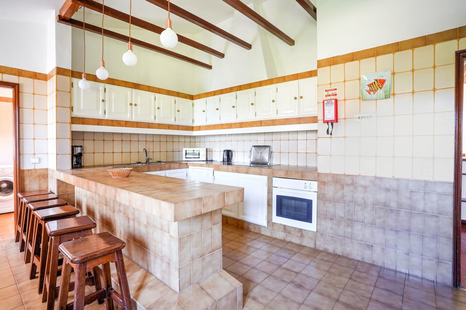 Villa | Private kitchen | Stovetop, coffee/tea maker