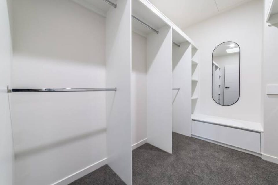 Master suite with walk-in robe, ensuite and optional cot on request.