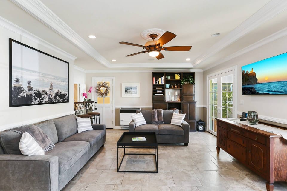 This living room feature a SmartTV and seating to watch your favorite show or the game.