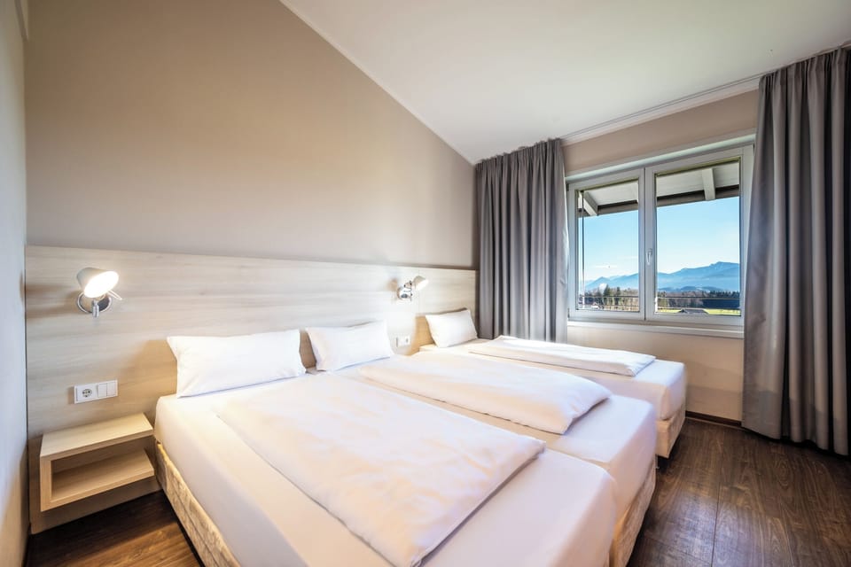 Triple Room | Pillowtop beds, desk, free WiFi, bed sheets