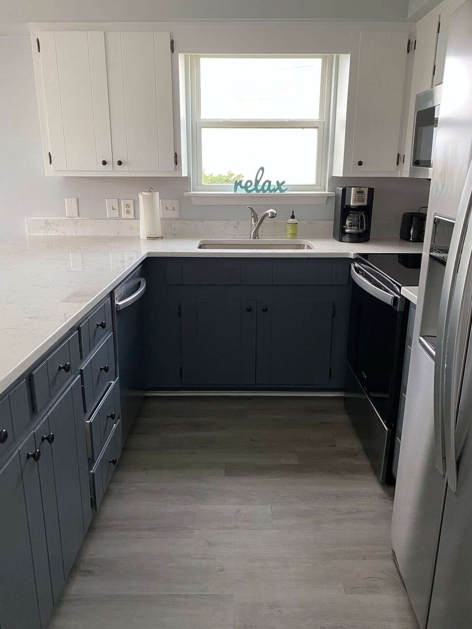 The kitchen is remodeled with all-new appliances. The dishwasher is so quiet!