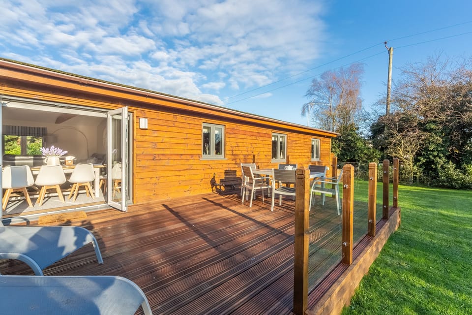 The spacious patio accessed from french doors