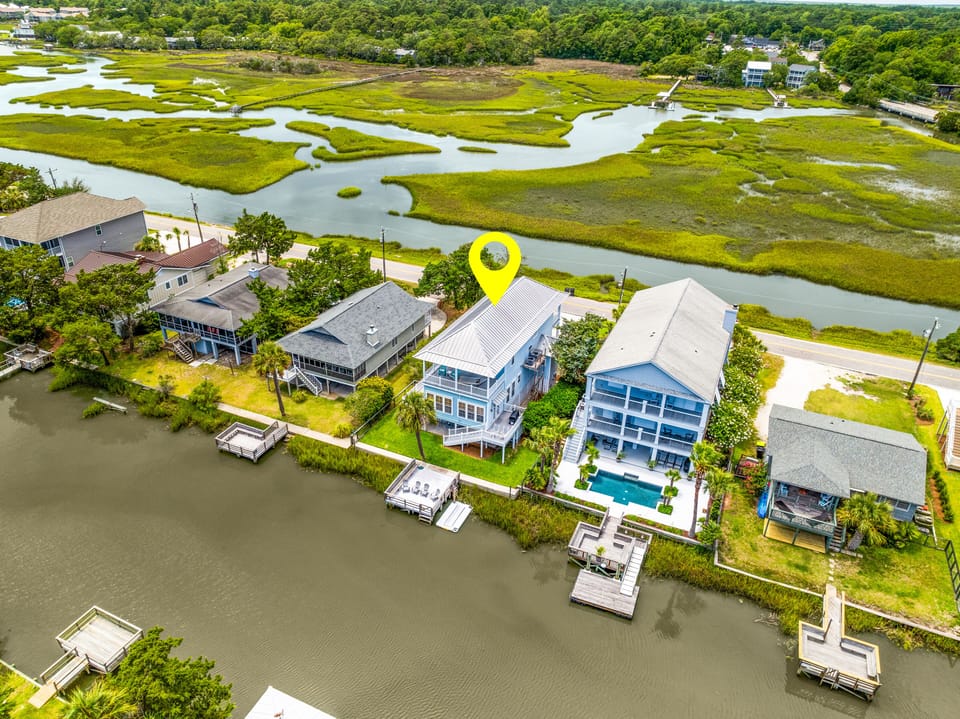 Canal side views of our vacation home. Enjoy fishing or boating off of our dock!