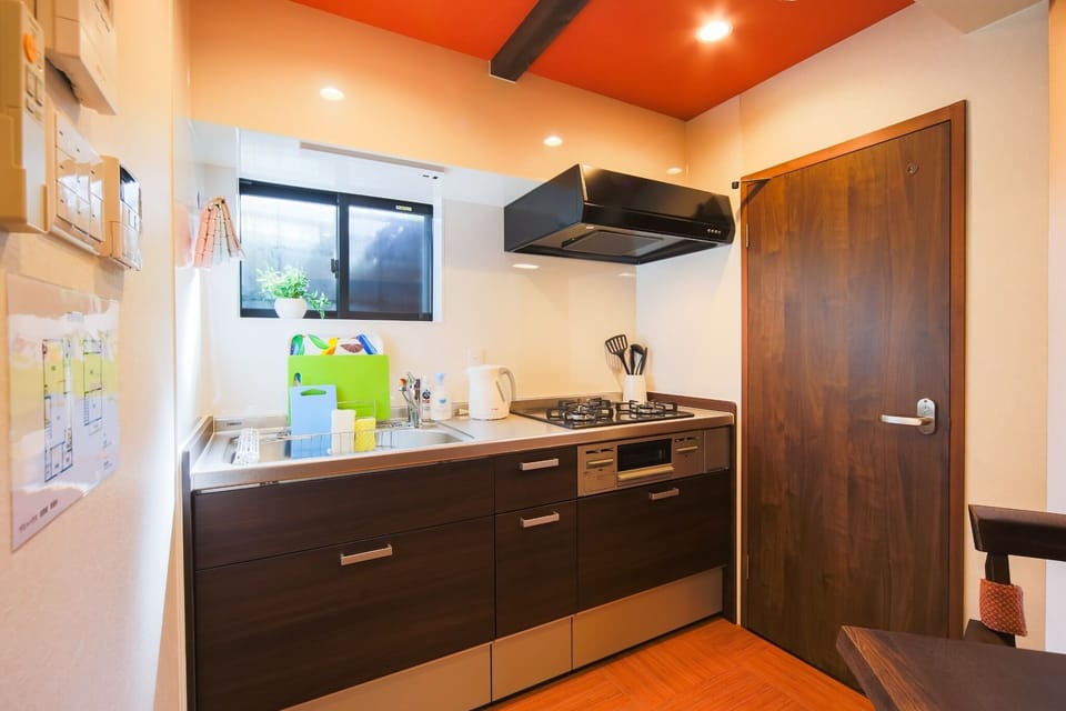 Kitchen with 3 stoves and grill