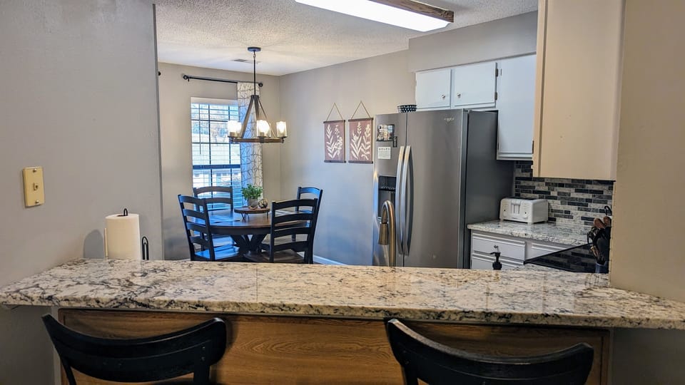 View into kitchen from dining area
