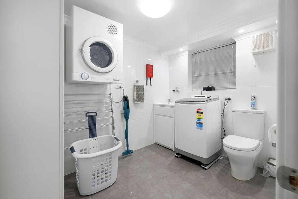 Laundry with the lot - includes a third toilet & a large private clothes line out the back. 