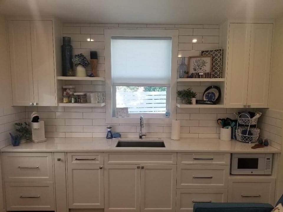 Fully stocked kitchenette with dishes,  Ref/Frz drawers, DW, MW, much more...