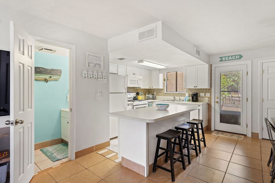 Kitchen - Seating for 3 at the Kitchen Island.