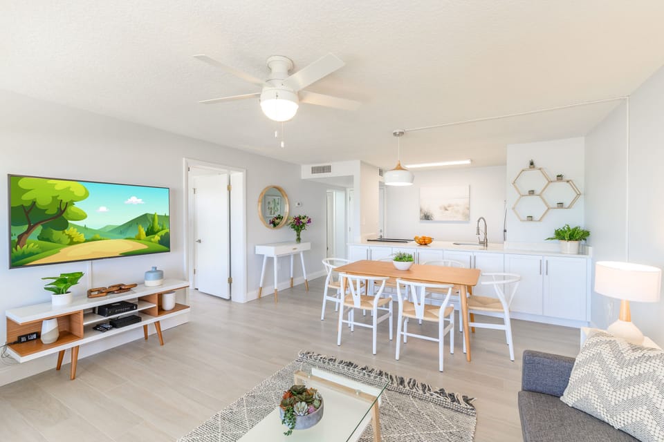 Charming dining area with coastal-themed decor and an airy, open feel.