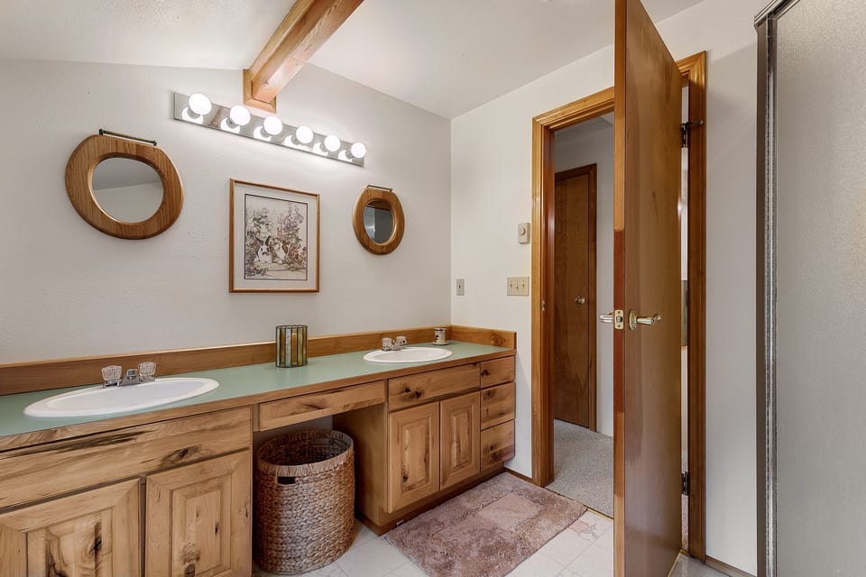 Upstairs bath- both have double sinks