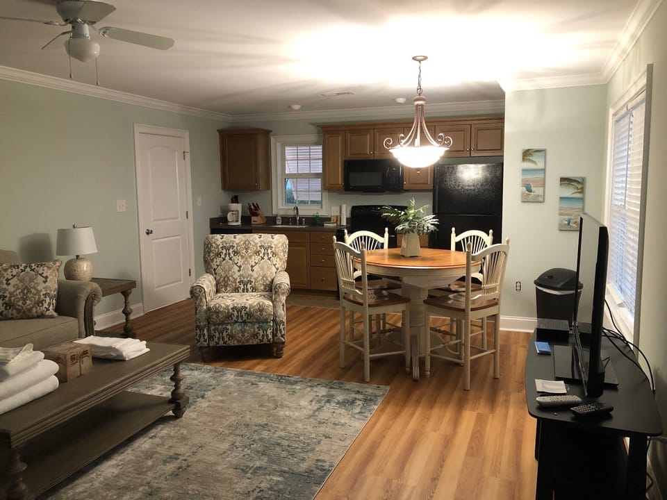 Lower level- Full Kitchen and family room with TV.