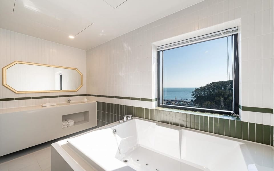 Presidential Suite | Bathroom | Designer toiletries, hair dryer, bathrobes, slippers
