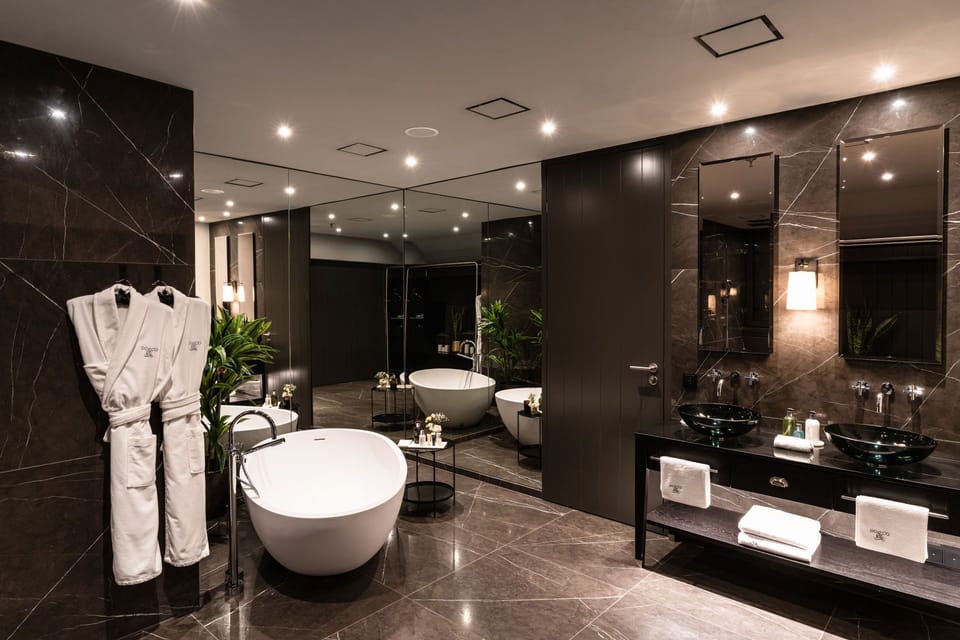 The Penthouse Loft - Suite including breakfast and complimentary minibar | Bathroom | Shower, rainfall showerhead, designer toiletries, hair dryer
