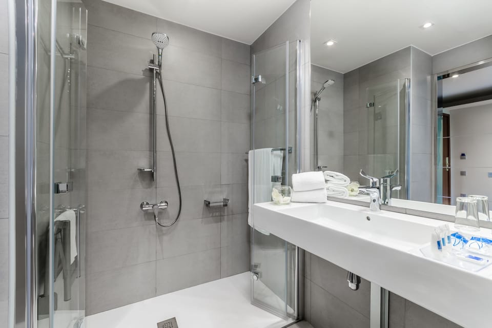 Eco-friendly toiletries, hair dryer, towels