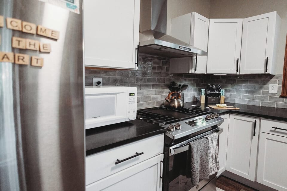 Microwave. Kettle. Utensils. Knives.






Is anyone reading these captions?