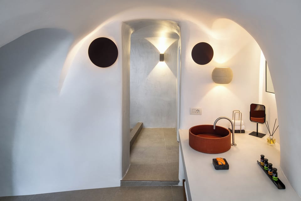 Superior Cave Double Courtyard View | Bathroom | Shower, hair dryer, slippers, towels