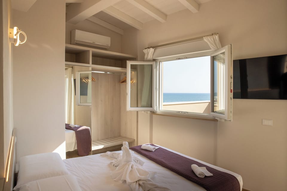 Superior Double Room, 1 Bedroom, Sea View | 1 bedroom, memory foam beds, minibar, in-room safe
