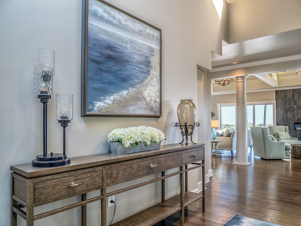 Entrance into the living room which has an abundance of natural light.