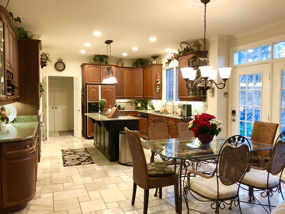Gorgeous Dining area opens to the spacious Family room and kitchen.