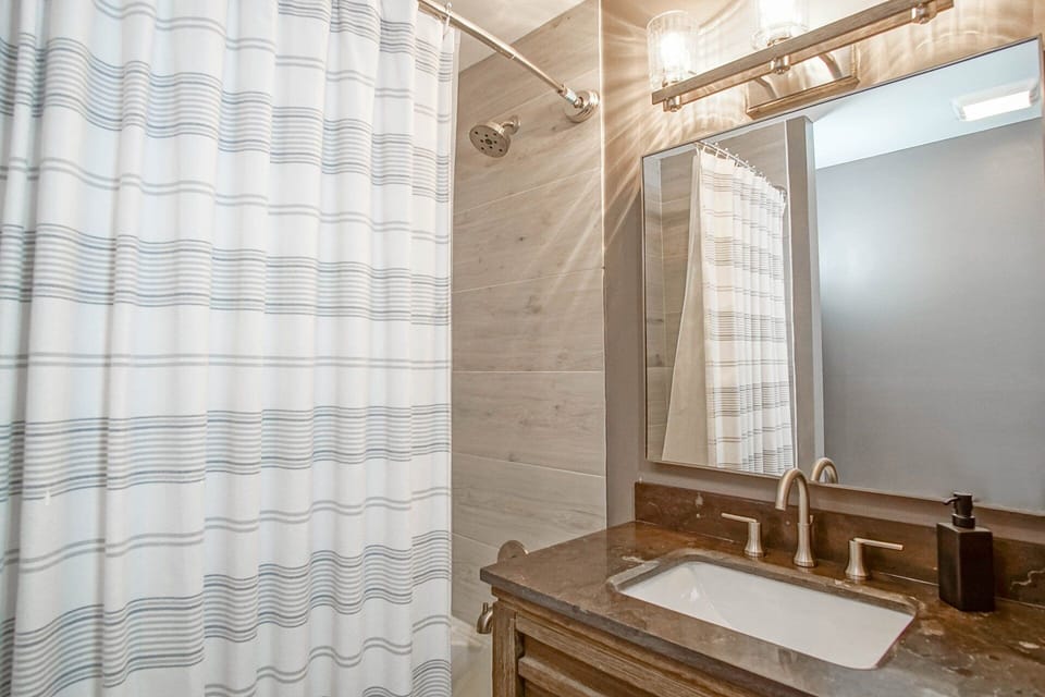 This is the shared bathroom located on the 3rd floor.
